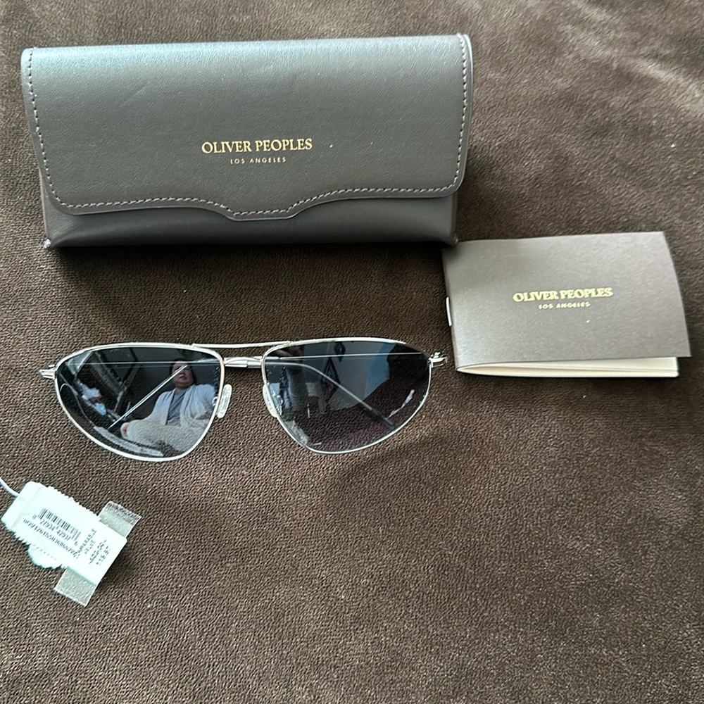 Oliver Peoples Silver Frame Sunglasses with Dark Lenses
